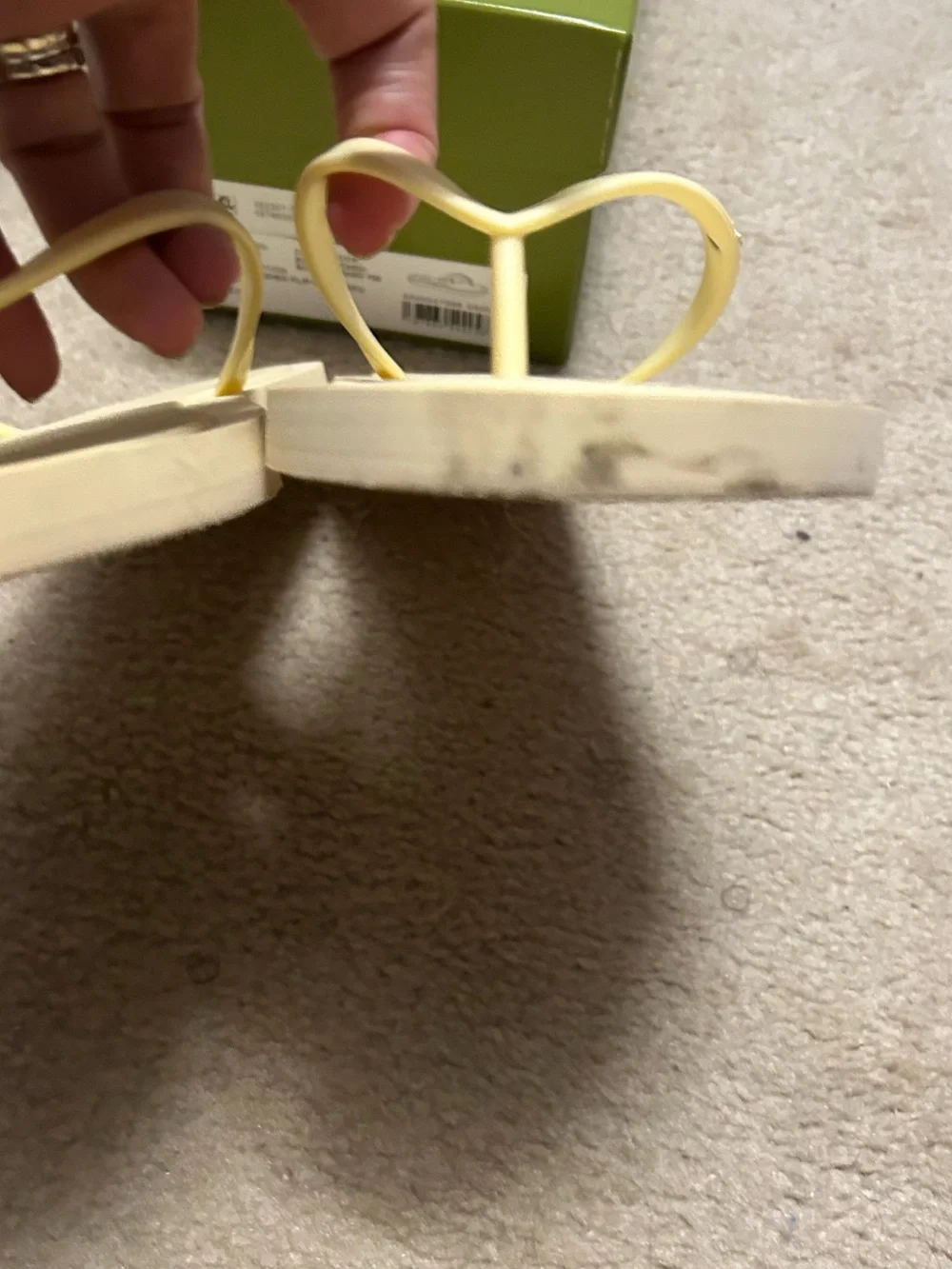 TORY BURCH KIRA padded flip flops in light yellow.